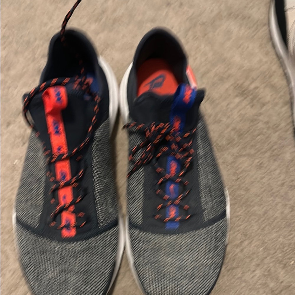 Stylish Gray blue and  Red Nike men's Sneakers.  Size 10.5 never worn